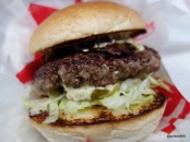 Wholey Cow - Bloomin' Neck Burger (6 Oz Hamburger, Slow-Cooked Shortrib, Shredded Iceberg, Pickels, Smokey Onion & Mustard Sauce)